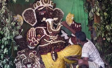 Covid-19: Unable to get raw material, Indore idol makers stare at losses An idol of Lord Ganesh made of figs, dry fruits and nuts being prepared ahead of Ganesh Chaturthi festival, in Chennai