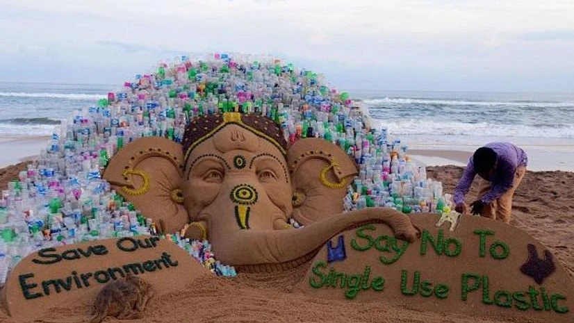Sand artist Sudarsan Pattnaik creates a sand sculpture of lord Ganesha with a messges 'Say No to Single Use Plastic and Save our Environment ', ahead of Ganesh Chaturthi festival, at Puri beach of Odisha Sand artist Sudarsan Pattnaik creates a sand sculpture of lord Ganesha with a messges 'Say No to Single Use Plastic and Save our Environment ', ahead of Ganesh Chaturthi festival, at Puri beach of Odisha