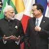 Prime Minister Narendra Modi with China's Premier Li Keqiang at RCEP meeting in Singapore in November last year. India did not sign on the RCEP at the meet in Singapore purely on economic grounds  	Photo: Reuters