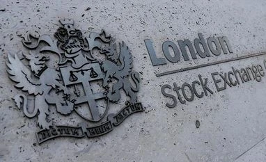 EU antitrust regulators to clear $27 billion LSE, Refinitiv deal: Report FILE PHOTO: Signage is seen outside the entrance of the London Stock Exchange in London, Britain. Aug 23, 2018. REUTERS/Peter Nicholls/File Photo
