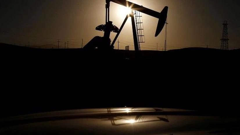 A pump jack is seen at sunrise near Bakersfield, California October 14, 2014. REUTERS saudi aramco
