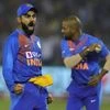 Virat Kohli and Shikhar Dhawan celebrate after Quinton de Kock's wicket