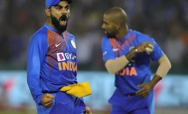 Ind vs SA 2nd T20I: India win by 7 wickets as Kohli shines with the bat Virat Kohli and Shikhar Dhawan celebrate after Quinton de Kock's wicket