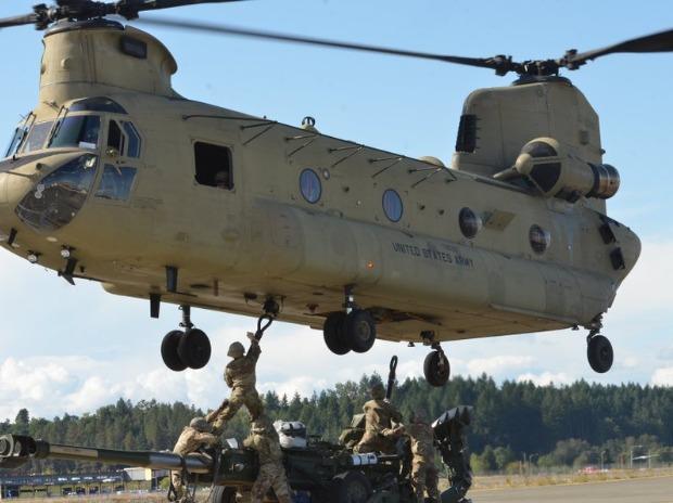 Chinook and ultra-light howitzers have been acquired by India also and both would be used during Exercise HimVijay in Arunachal Pradesh Chinook and ultra-light howitzers have been acquired by India also and both would be used during Exercise HimVijay in Arunachal Pradesh