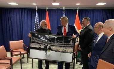 Donald Trump says US will have a trade deal with India 'very soon' PM Narendra Modi presented a framed photograph from the Howdy Modi event to US President Donald Trump | Credits: @ANI