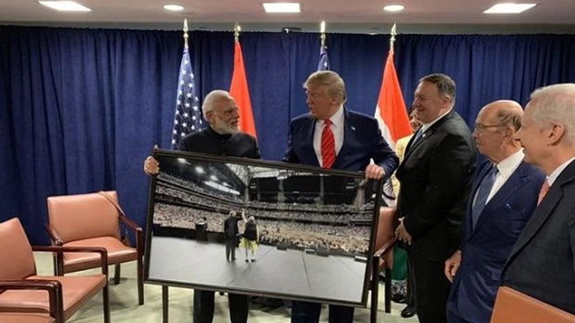 PM Narendra Modi presented a framed photograph from the Howdy Modi event to US President Donald Trump | Credits: @ANI PM Narendra Modi presented a framed photograph from the Howdy Modi event to US President Donald Trump | Credits: @ANI