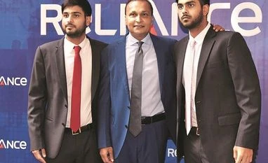 Anil Ambani's RCap to exit lending business, stay focused on insurance Anil Ambani, chairman, Reliance ADA Group, flanked by sons Anmol (left) and Anshul at the AGM in Mumbai Photo: Kamlesh Pednekar