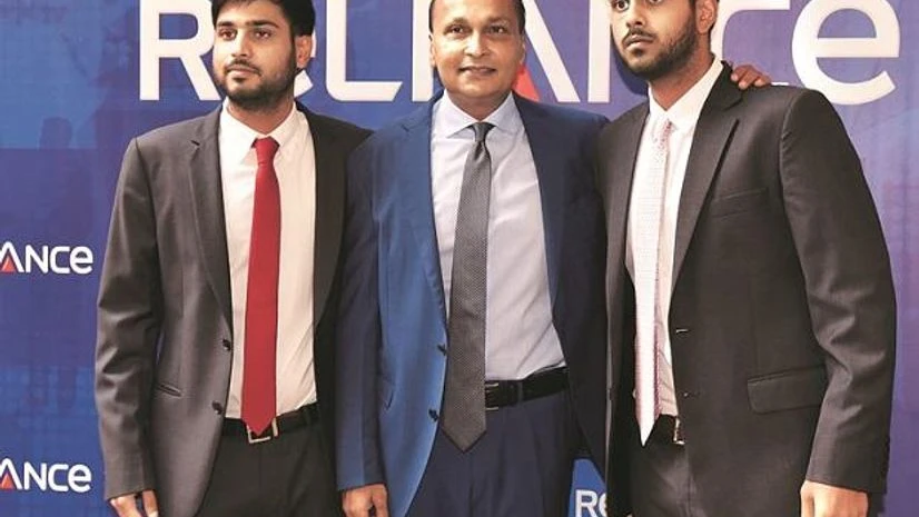 Anil Ambani, chairman, Reliance ADA Group, flanked by sons Anmol (left) and Anshul at the AGM in Mumbai Photo: Kamlesh Pednekar Anil Ambani, chairman, Reliance ADA Group, flanked by sons Anmol (left) and Anshul at the AGM in Mumbai Photo: Kamlesh Pednekar