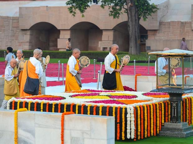 Buddhist monks pay homage to Mahatma Gandhi on his birth anniversary at Rajghat Buddhist monks pay homage to Mahatma Gandhi on his birth anniversary at Rajghat