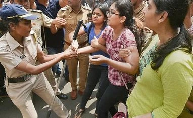 Trees cut down in Aarey Colony as police stand guard against protests Mumbai: Police detain activists who were staging a protest against the tree-cutting, being carried out for the Metro car shed project, at Aarey colony in Mumbai, Saturday, Oct. 5, 2019. (PTI Photo/Mitesh Bhuvad) (