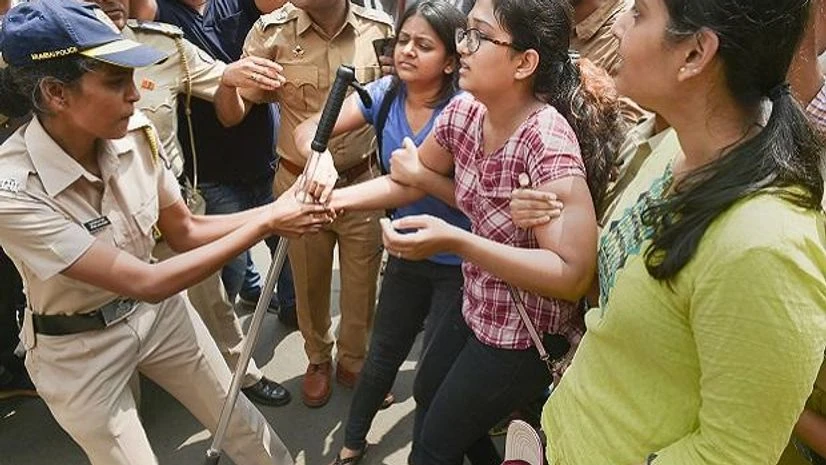 Mumbai: Police detain activists who were staging a protest against the tree-cutting, being carried out for the Metro car shed project, at Aarey colony in Mumbai, Saturday, Oct. 5, 2019. (PTI Photo/Mitesh Bhuvad) ( Mumbai: Police detain activists who were staging a protest against the tree-cutting, being carried out for the Metro car shed project, at Aarey colony in Mumbai, Saturday, Oct. 5, 2019. (PTI Photo/Mitesh Bhuvad) (