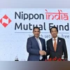 L to R - Hiroshi Shimizu, President, Nippon Life Insurance Company and Sundeep Sikka, ED & CEO, Nippon India Mutual Fund during the Press Conference Nippon Life Insurance announced '' Reliance Mutual Fund" renamed as Nippon India Mutual Fund in Mumb L to R - Hiroshi Shimizu, President, Nippon Life Insurance Company and Sundeep Sikka, ED & CEO, Nippon India Mutual Fund during the Press Conference Nippon Life Insurance announced '' Reliance Mutual Fund" renamed as Nippon India Mutual Fund in Mumb