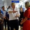 British Prime Minister Boris Johnson speaks to nurses as he visits Watford General Hospital in Watford, Britain