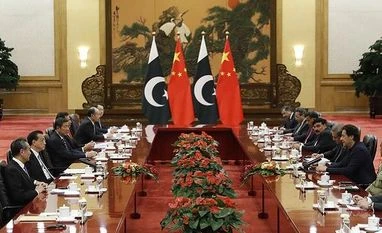 Pakistan, China to expand CPEC scope to copper, gold, oil and gas sectors Beijing: Pakistan's Prime Minister Imran Khan, third right, meets with Chinese Premier Li Keqiang, second left, at the Great Hall of the People in Beijing on October 8, 2019. AP/PTI(