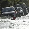 London: Parked cars are engulfed in water on a flooded street in north London, after a pipe burst early Tuesday Oct. 8, 2019. Some residents had to be evacuated from their homes after a major pipe burst and flooded a north London street. AP/PTI(