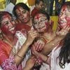 Patna: Hindu women smear vermilion on each other during 'Sindoor Khela'on the Vijayadashmi festival in Patna, Tuesday, Oct. 8, 2019. (PTI Photo)(