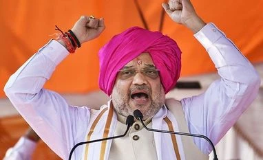 Amit Shah slams Congress over Artcle 370, Ayodhya verdict in Jharkhand Beed: Home Minister Amit Shah addresses a Dussehra rally organised in Maharashtra's Beed district, Tuesday, Oct. 8, 2019. Shah on Tuesday said PM Narendra Modi addressed the issues of backward classes by setting up an OBC commission, which the previo