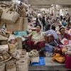 Kauna grass craft - women selling kauna basket at ima market