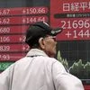 Tokyo: A man looks at an electronic stock board showing Japan's Nikkei 225 index at a securities firm in Tokyo Friday, Oct. 11, 2019. Asian stock markets followed Wall Street higher Friday on optimism about U.S.-Chinese talks on ending a tariff war.