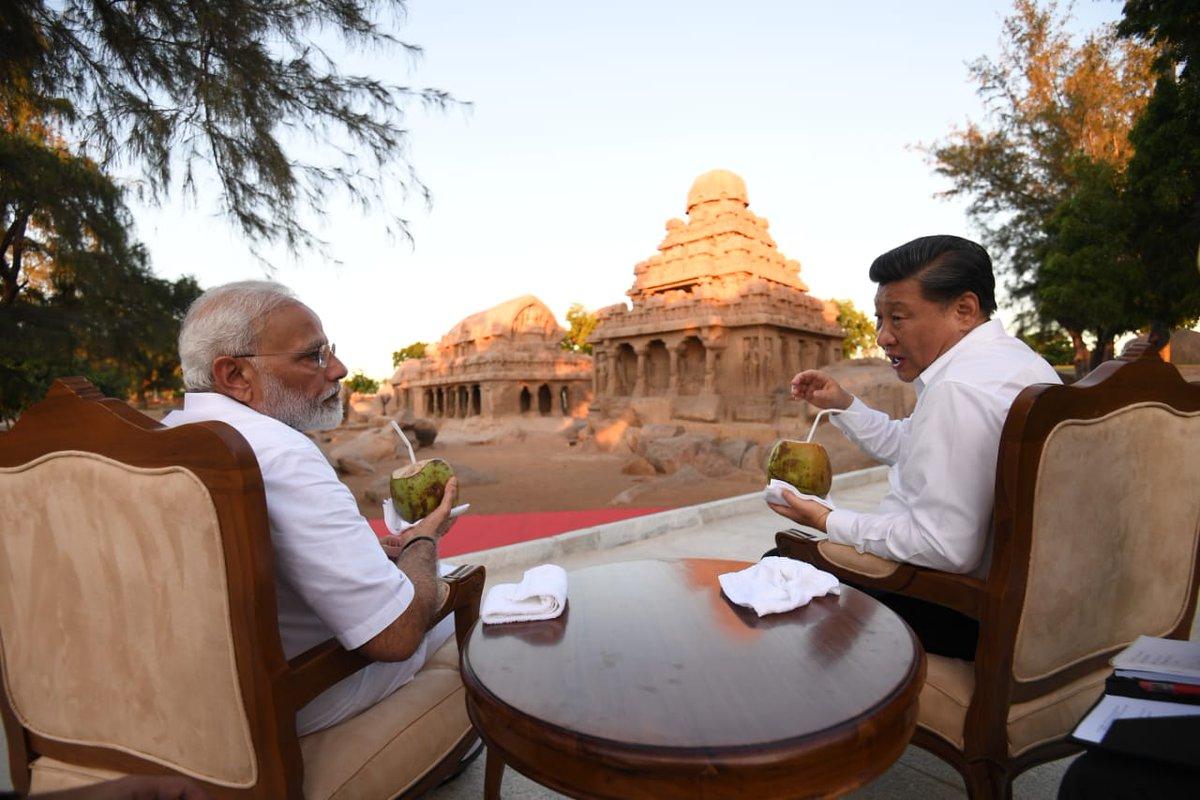 The Indian Prime Minister and the Chinese premier discussing bilateral issues over tender coconut. The Indian Prime Minister and the Chinese premier discussing bilateral issues over tender coconut.