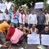 Hyderabad: Agitating Telangana State Road Transport Corporation (TSRTC) get their heads tonsured during their ongoing strike, in Hyderabad, Wednesday, Oct. 16, 2019