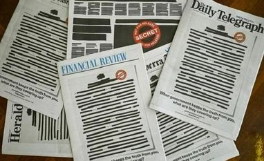 Australian newspapers black out front page to protest media restrictions Australian newspapers