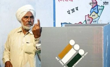 Eelection Commission to announce schedule of bypolls at appropriate time First voter Ajjaib Singh shows his finger after casting vote in Khurkara polling station in Ambala constituency