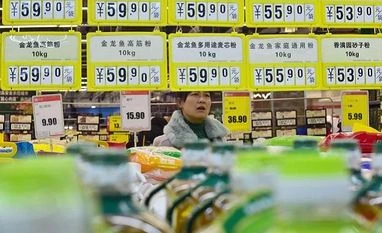 Chinese inflation hits eight-year high in November as pork prices double China Economy