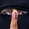 Nagpur: A voter shows her inked finger after casting vote during the Maharashtra Assembly elctions, in Nagpur, Monday, Oct. 21, 2019.