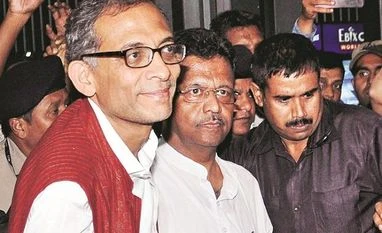 Bengal's Firhad Hakim becomes second minister to take 'Covaxin' trial shot Nobel Laureate Abhijit Banerjee with Kolkata Mayor Firhad Hakim