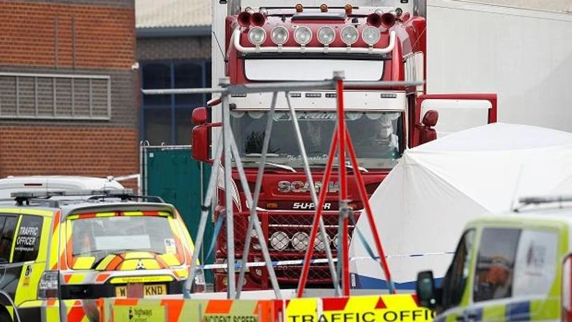 Police forensics at the scene where bodies were discovered in a lorry container, in Grays, Essex, Britain. Photo: Reuters Police forensics at the scene where bodies were discovered in a lorry container, in Grays, Essex, Britain. Photo: Reuters
