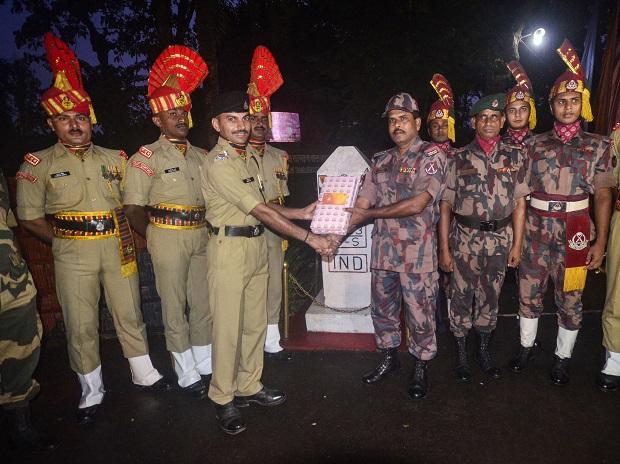 BSF personnel exchange sweets with Border Guard of Bangladesh ahead of Diwali BSF personnel exchange sweets with Border Guard of Bangladesh ahead of Diwali