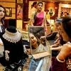 Women buy gold ornaments on the occasion of Dhanteras festival at a shop in Amritsar