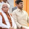 Haryana's new Chief Minister Manohar Lal Khattar and Deputy Cheif Minister Dushyant Chautala after taking oath during a swearing-in ceremony, in Chandigarh, Sunday, Oct. 27, 2019