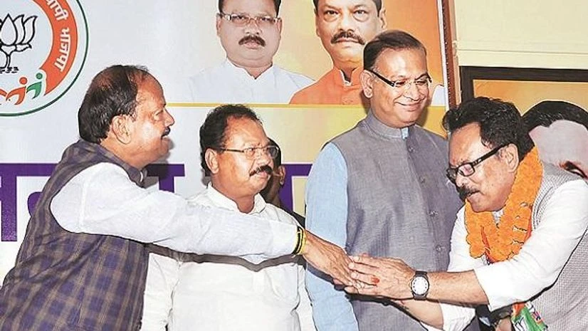 Sukhdeo Bhagat (right) gave a huge jolt to the Congress by crossing over to the BJP Sukhdeo Bhagat (right) gave a huge jolt to the Congress by crossing over to the BJP
