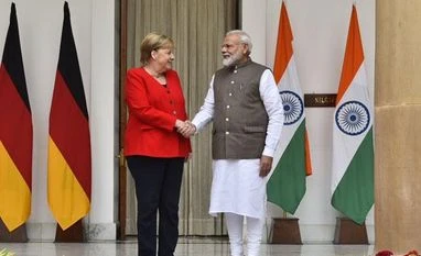 India, Germany ink 11 pacts, vow to build 'new India' by 2022, says PM Modi PM Narendra Modi and German Chancellor Merkel ahead of the 5th Indo-German Inter-Governmental Consultations