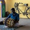 Thavil: A musician uses the instrument