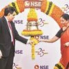 Union Finance Minister Nirmala Sitharaman and Sebi Chairman Ajay Tyagi ring the closing bell to conclude the silver jubilee celebrations of the NSE, in Mumbai on Tuesday 	Photo:PTI