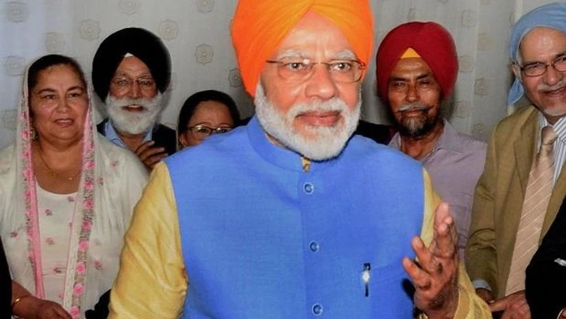 Modi Prime Minister Narendra Modi arrives to meet with an NRI delegation, which will use Kartarpur corridor to reach Gurdwara Darbar Sahib in Kartarpur (Pakistan), at Dera Baba Nanak in Gurdaspur, Saturday, Nov. 9, 2019