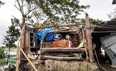 Cyclone Bulbul kills 12 in Bangladesh, around 6,000 homes damaged A woman is seen inside her damaged house after cyclone Bulbul hit the area in Khulna, Bangladesh, November 10, 2019. Reuters/Kazi Fazle