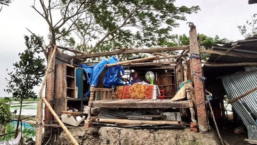 A woman is seen inside her damaged house after cyclone Bulbul hit the area in Khulna, Bangladesh, November 10, 2019. Reuters/Kazi Fazle A woman is seen inside her damaged house after cyclone Bulbul hit the area in Khulna, Bangladesh, November 10, 2019. Reuters/Kazi Fazle