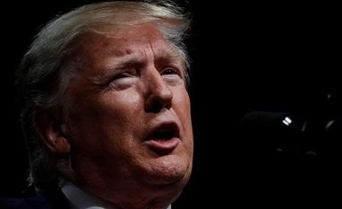 US proposes to bring tougher work permit rules for immigrant workers Donald Trump