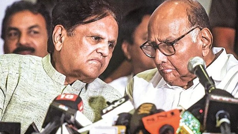 Nationalist Congress Party chief Sharad Pawar and Congress leader Ahmed Patel during a joint press conference in Mumbai on Tuesday Photo: PTI Nationalist Congress Party chief Sharad Pawar and Congress leader Ahmed Patel during a joint press conference in Mumbai on Tuesday Photo: PTI