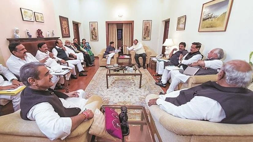 Sharad Pawar, Ahmed Pate NCP chief Sharad Pawar, senior Congress leader Ahmed Patel and others during a meeting at Pawar’s residence in New Delhi on Wednesday Photo: PTI