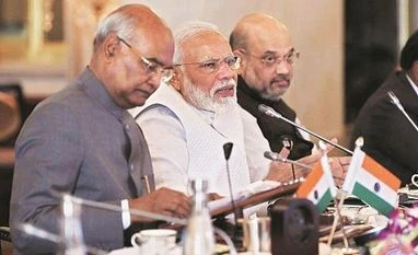 Prime Minister Narendra Modi flanked by President Ram Nath Kovind and Home Minsiter Amit Shah at the 50th annual Conference of Governors at Rashtrapati Bhavan on Sunday Prime Minister Narendra Modi flanked by President Ram Nath Kovind and Home Minsiter Amit Shah at the 50th annual Conference of Governors at Rashtrapati Bhavan on Sunday