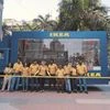 IKEA employees pose outside a van in Mumbai on Tuesday	| Photo: Reuters