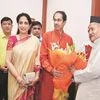 Maharashtra Governor Bhagat Singh Koshyari with CM-designate Uddhav Thackeray and his wife Rashmi Thackeray at Raj Bhavan in Mumbai