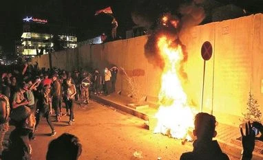 Iraqi forces gun down 28 protesters after Iranian consulate is set on fire Iraq protests