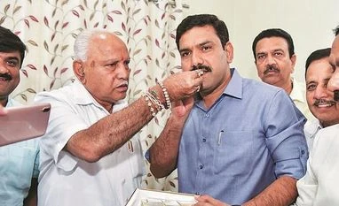 K'taka bypolls: With 12 seats Yediyurappa retains govt, Cong sees fallout Karnataka Chief Minister B S Yediyurappa, B S Yediyurappa, Karnataka, BJP, Bharatiya Janata Party, elections