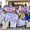 Women of an old-age home protest against the Citizenship Amendent Bill in Guwahati on December 9, 2019. (Photo: PTI)